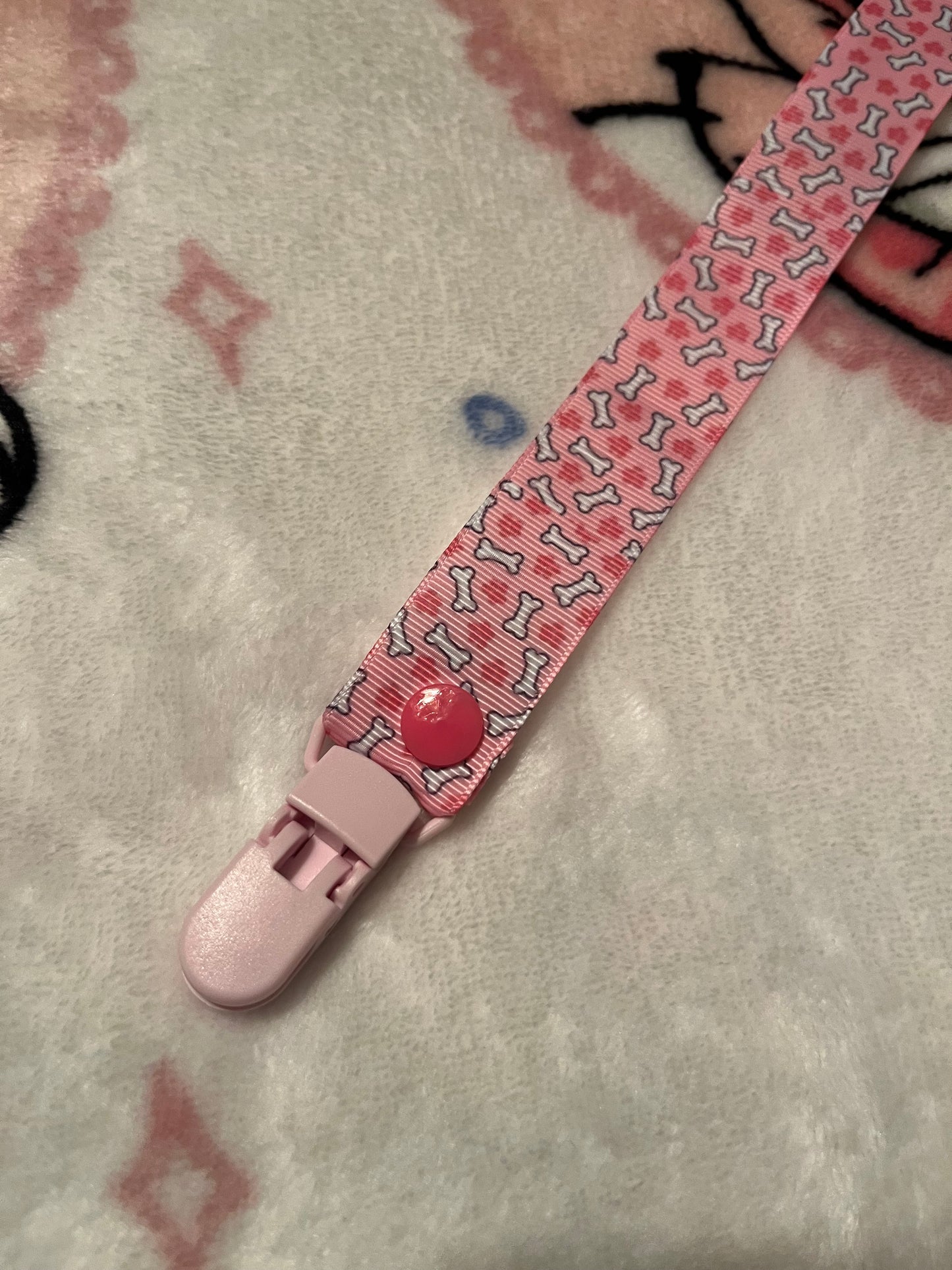 Pink Bones and Paws Pacifier Clip