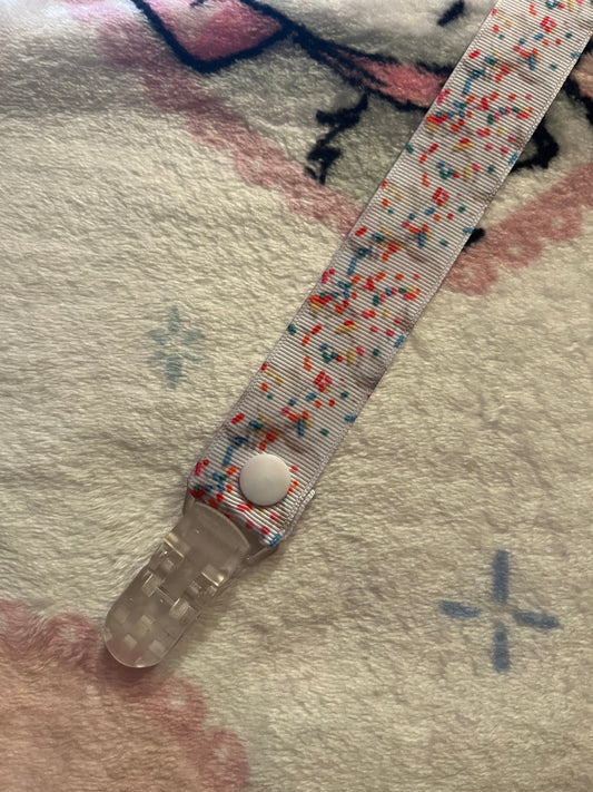White Frosting with Sprinkles Pacifier Clip